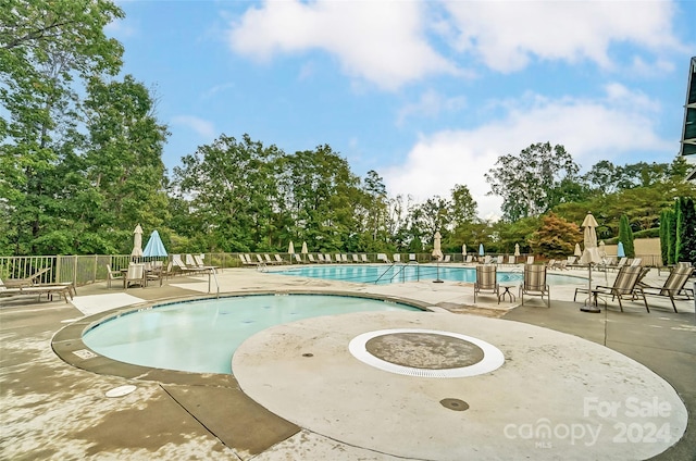 view of pool with a patio area