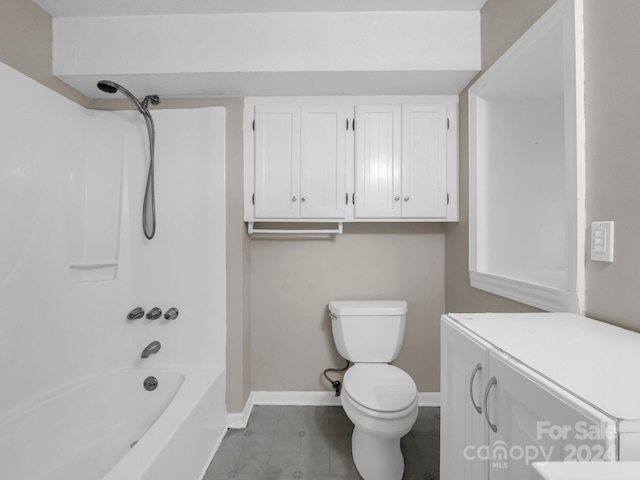 full bathroom featuring toilet, vanity, and bathing tub / shower combination