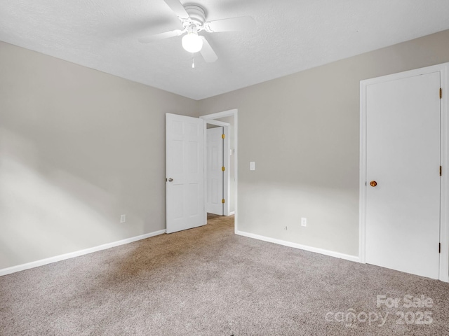 200 Frost Rd, Saluda, NC 28773 - spare room with carpet flooring, ceiling fan, and baseboards