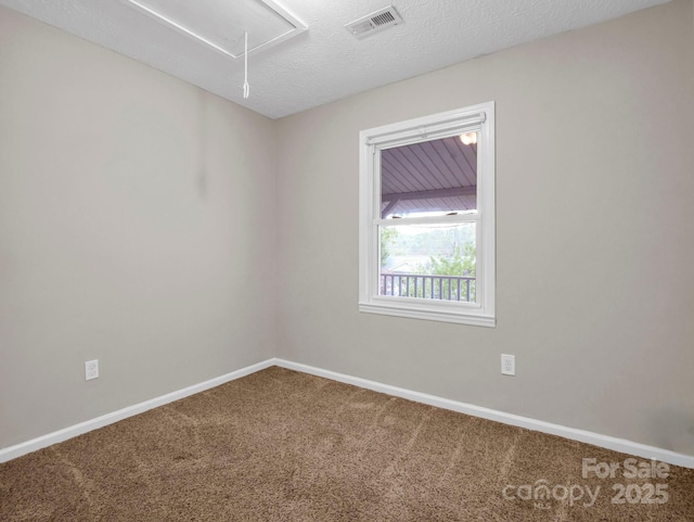 200 Frost Rd, Saluda, NC 28773 - unfurnished room featuring attic access, carpet flooring, and baseboards
