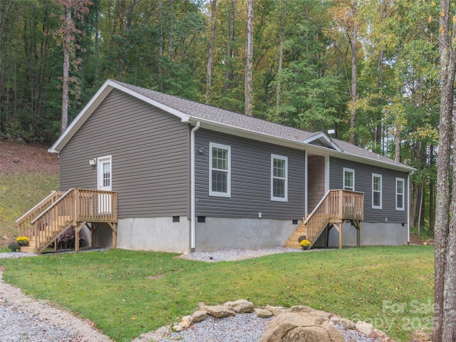 view of front of home featuring a front yard