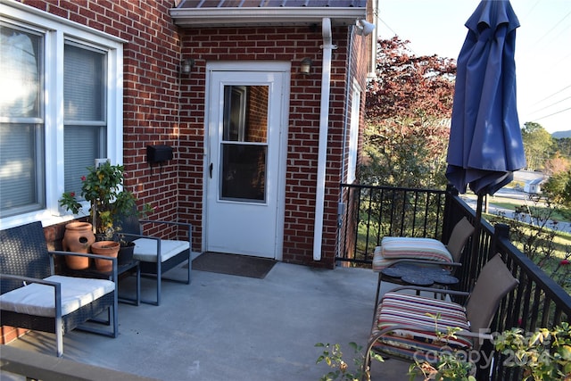 property entrance with a patio