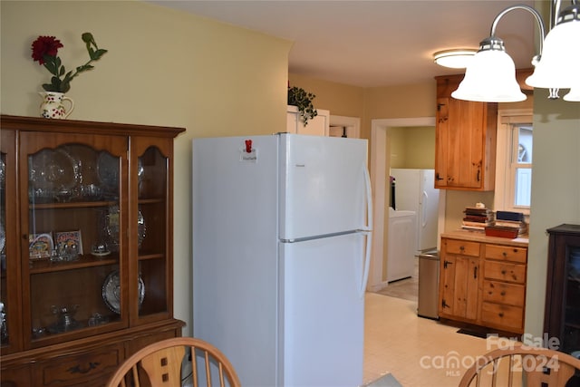 kitchen featuring white fridge