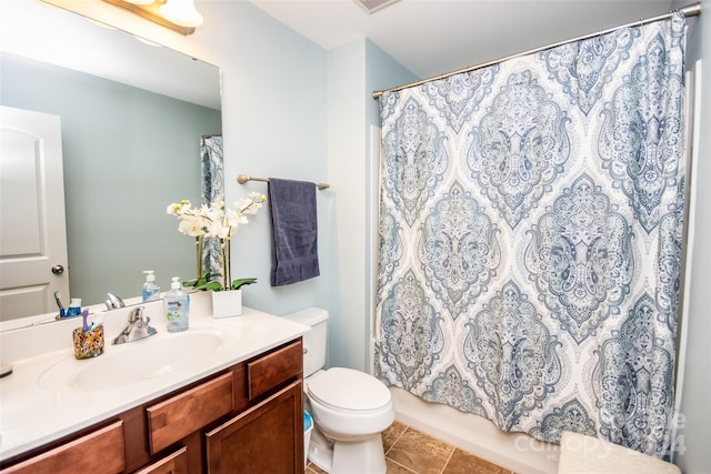 full bathroom with vanity, shower / tub combo, toilet, and tile patterned floors