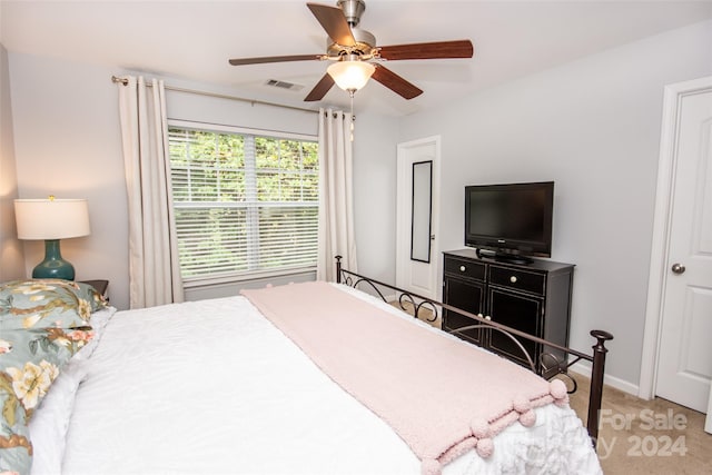 carpeted bedroom featuring ceiling fan