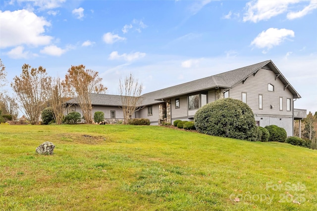 ranch-style home featuring a front yard