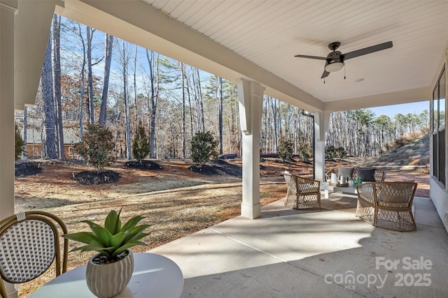 view of patio / terrace featuring ceiling fan