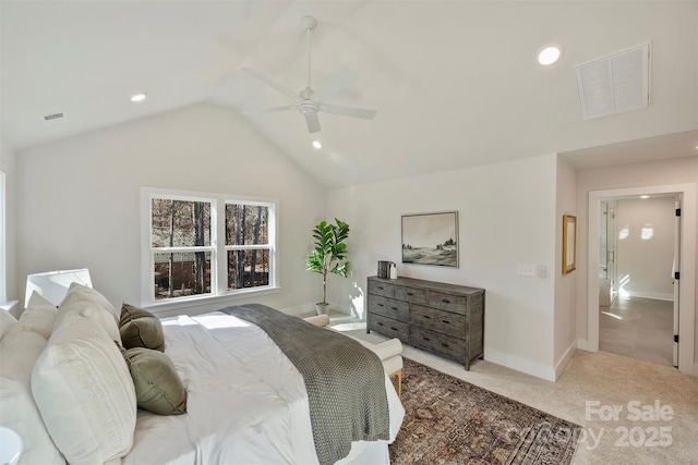 bedroom featuring ceiling fan, light colored carpet, and vaulted ceiling