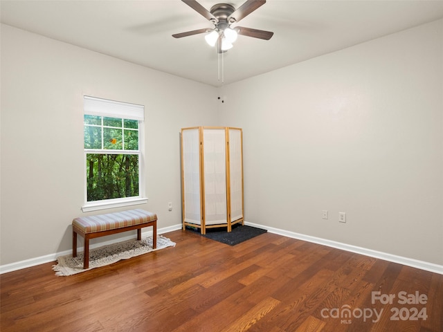 interior space featuring hardwood / wood-style floors and ceiling fan