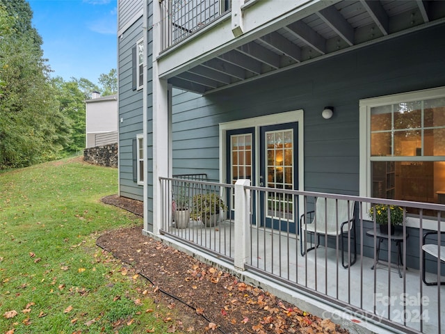 deck featuring a lawn