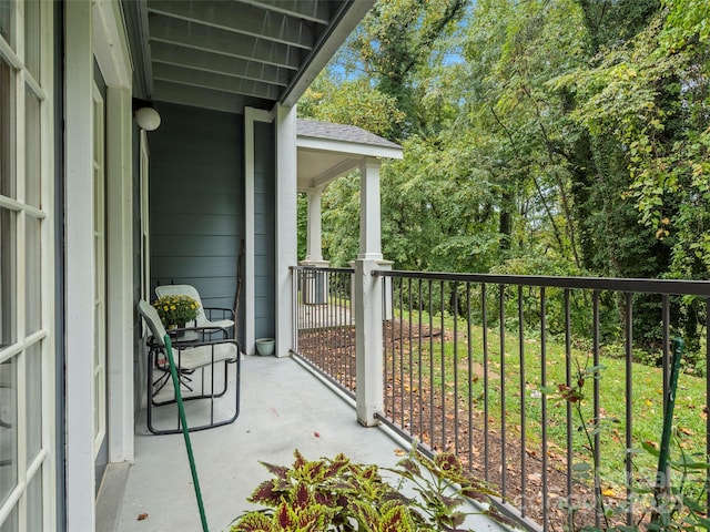 balcony featuring a porch