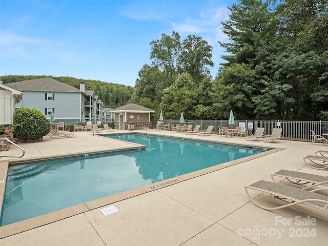 view of pool with a patio area