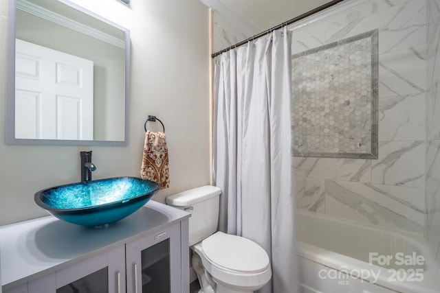 full bathroom featuring vanity, toilet, and shower / tub combo