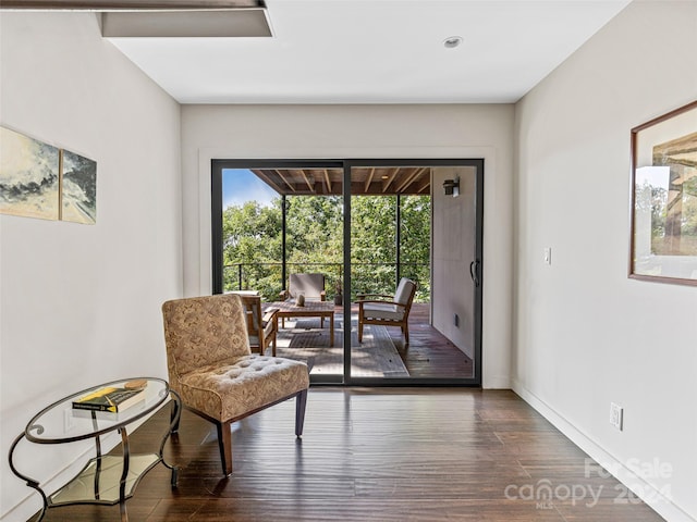 sitting room featuring hardwood / wood-style flooring