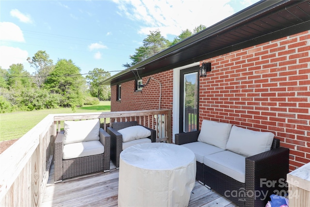 deck featuring outdoor lounge area