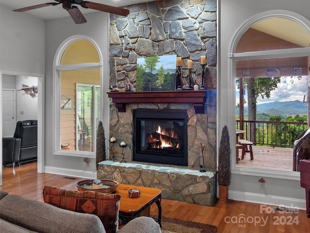 445 Equestrian Dr, Waynesville, NC 28786 - living room with wood finished floors, baseboards, and ceiling fan