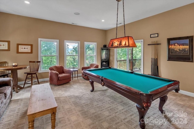 rec room featuring light carpet, billiards, and a wealth of natural light