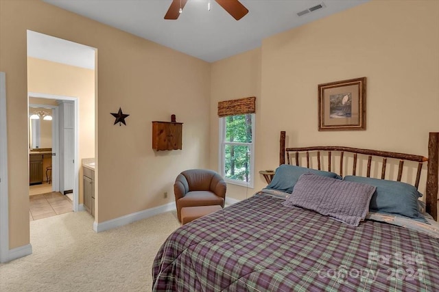 carpeted bedroom featuring ceiling fan and connected bathroom