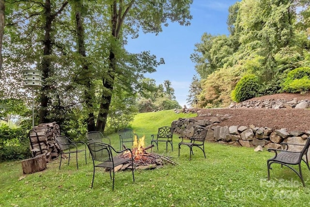 445 Equestrian Dr, Waynesville, NC 28786 - view of grassy yard featuring a fire pit