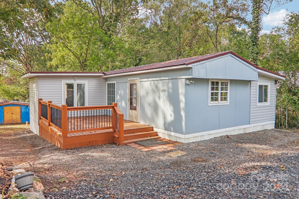 view of front of house with a deck