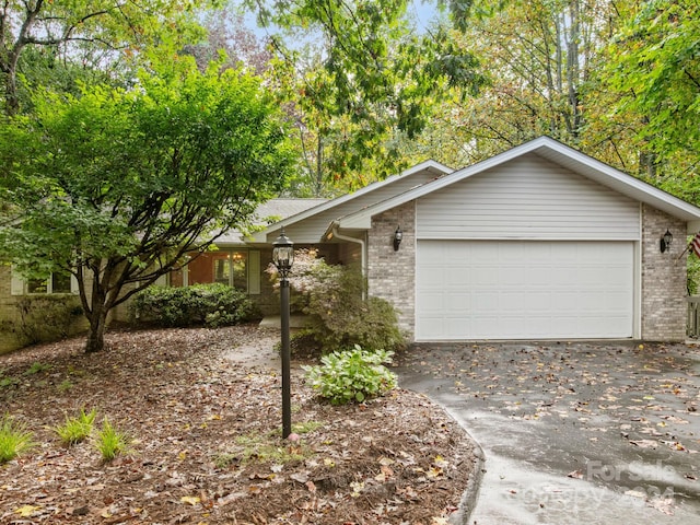 single story home with a garage