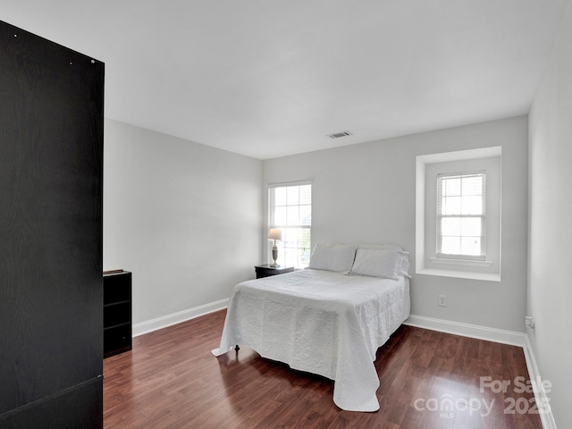 bedroom featuring hardwood / wood-style floors