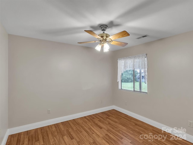 unfurnished room featuring wood-type flooring and ceiling fan