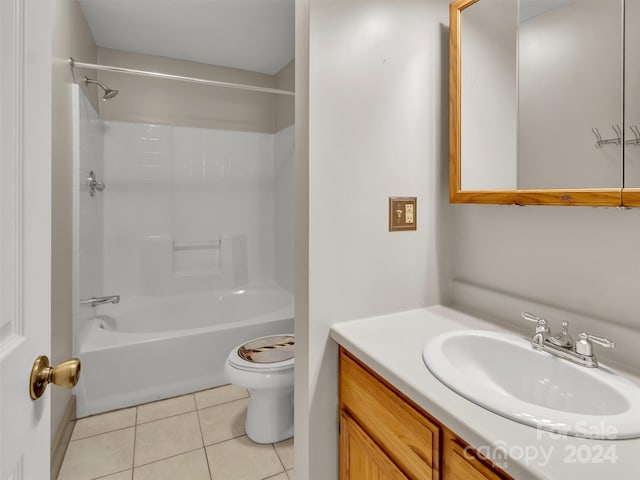 full bathroom with  shower combination, vanity, tile patterned flooring, and toilet