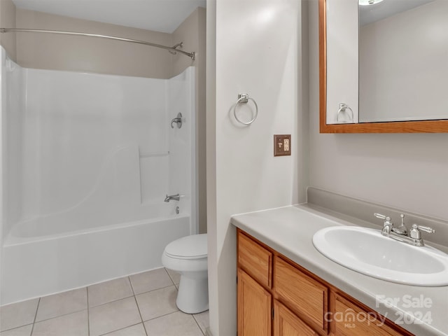 full bathroom with shower / bathtub combination, vanity, toilet, and tile patterned floors