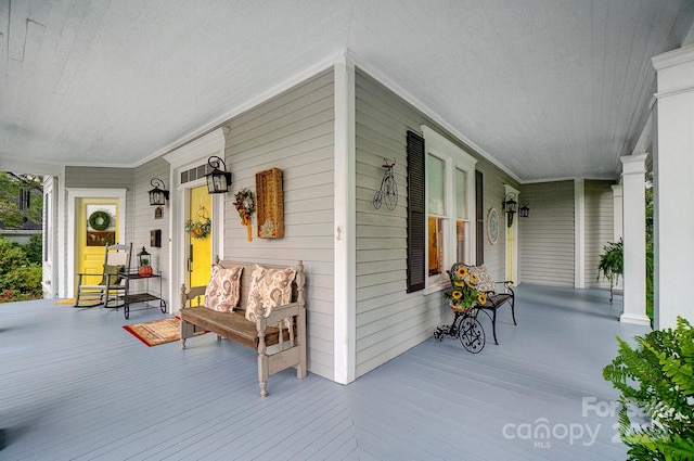 wooden terrace with covered porch