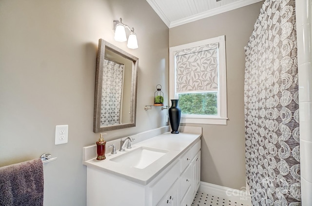 bathroom with vanity and ornamental molding