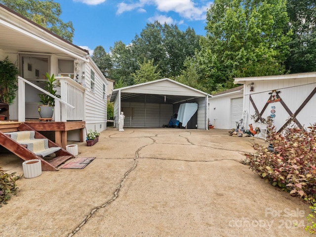 exterior space with a carport