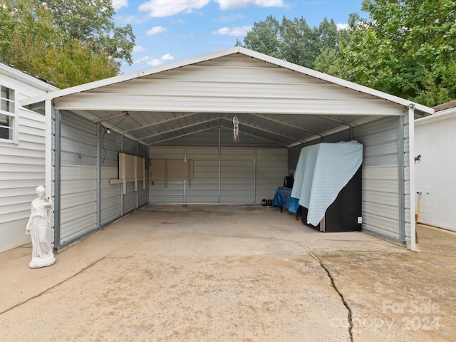 garage featuring a carport