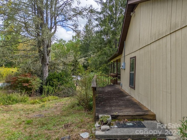 view of yard featuring a deck