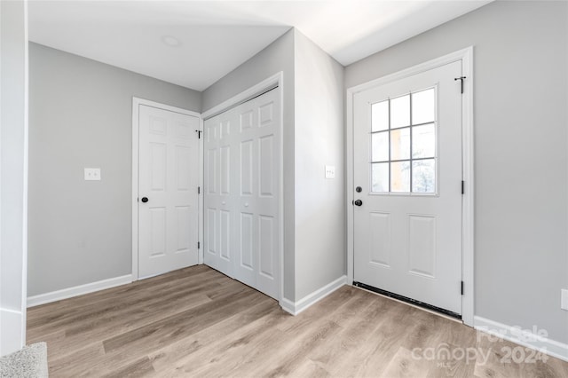 entrance foyer featuring light wood-type flooring