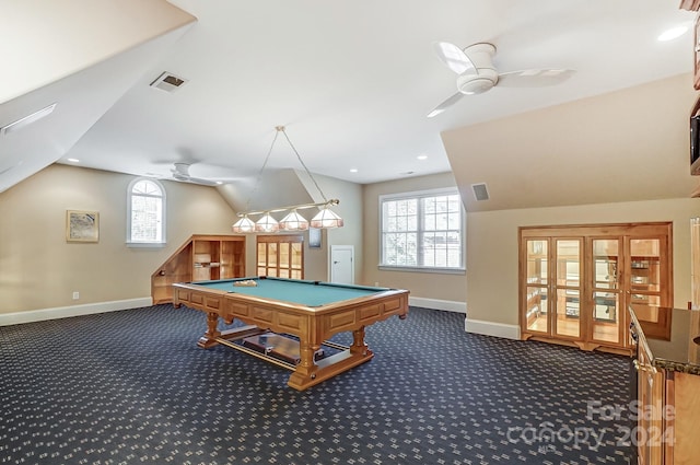 rec room with pool table, plenty of natural light, dark colored carpet, and ceiling fan