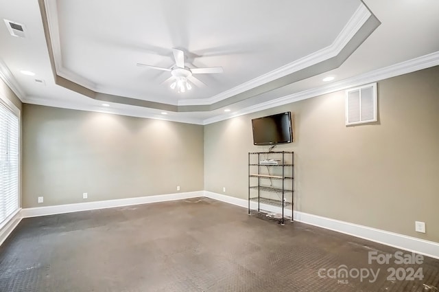 basement featuring ornamental molding and ceiling fan