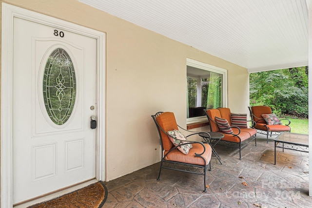 property entrance with a porch