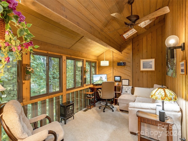 office featuring carpet, wood ceiling, wooden walls, and ceiling fan