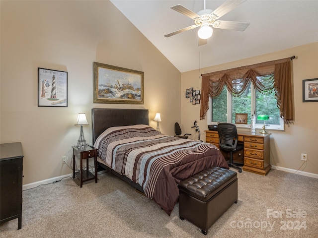 carpeted bedroom featuring lofted ceiling and ceiling fan