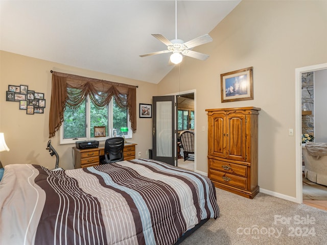 carpeted bedroom with ceiling fan and lofted ceiling