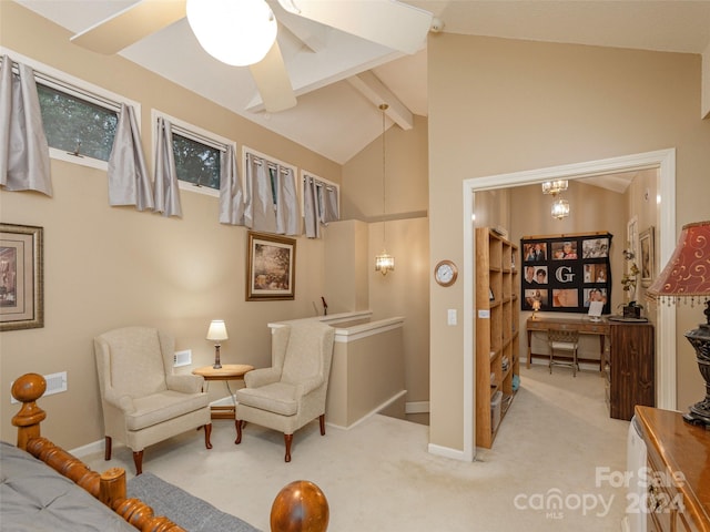 interior space featuring beamed ceiling, light carpet, ceiling fan, and high vaulted ceiling