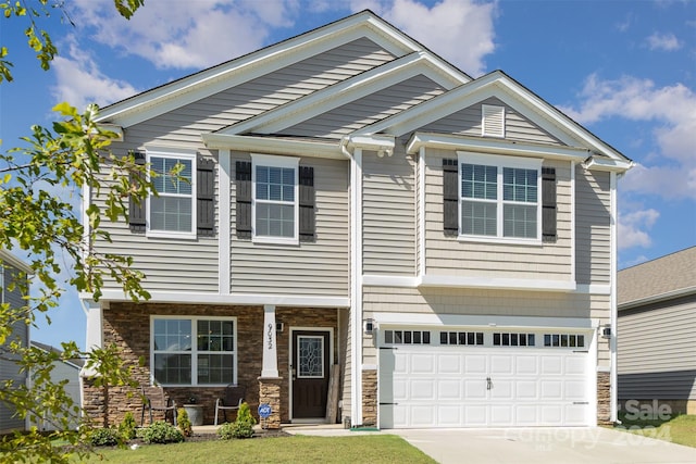 craftsman inspired home with a garage