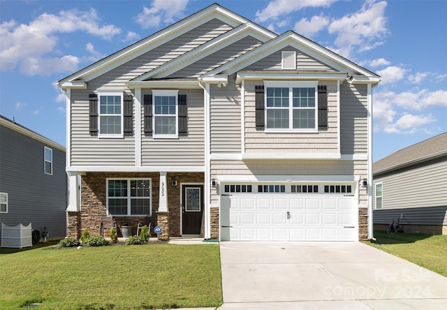 craftsman inspired home featuring a garage, central air condition unit, and a front yard