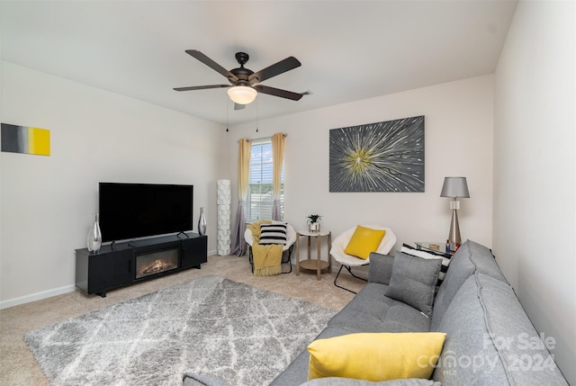 living room featuring carpet flooring and ceiling fan