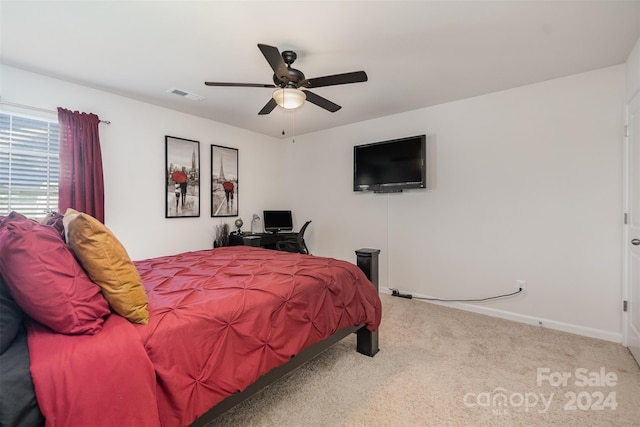 carpeted bedroom with ceiling fan