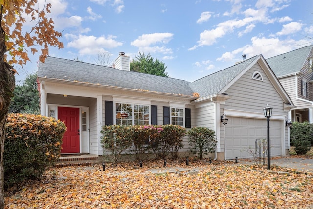 view of front of property featuring a garage