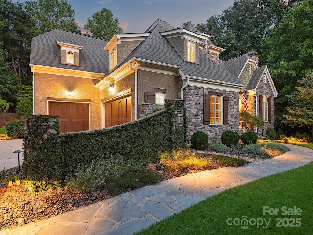 view of front of property with a garage