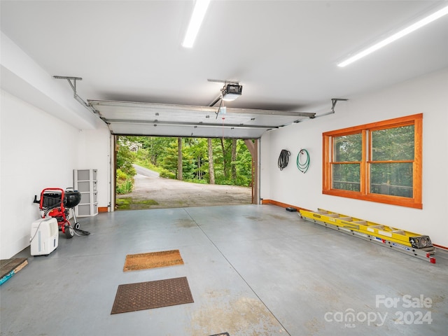 garage featuring a garage door opener