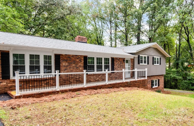 view of front of property with a front lawn